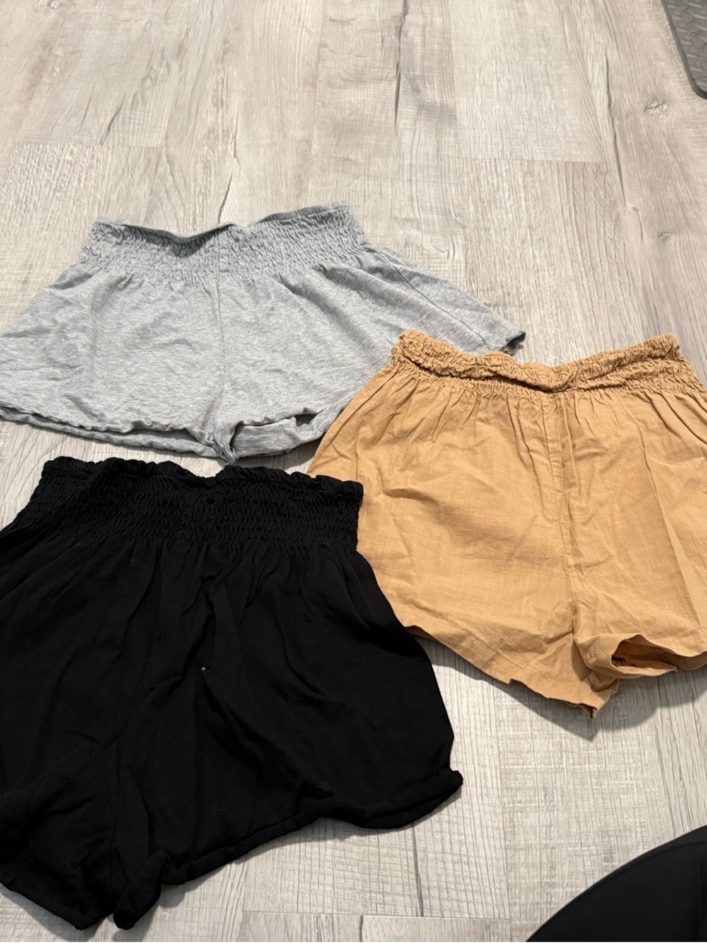 $12 for 3- High-Waist Smocked Shorts - Black, Gray, Tan